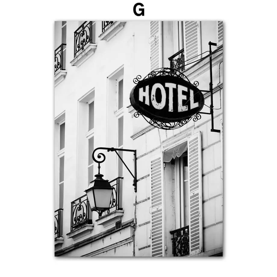 Poster of Hotel sign on a building facade with a vintage street lamp.