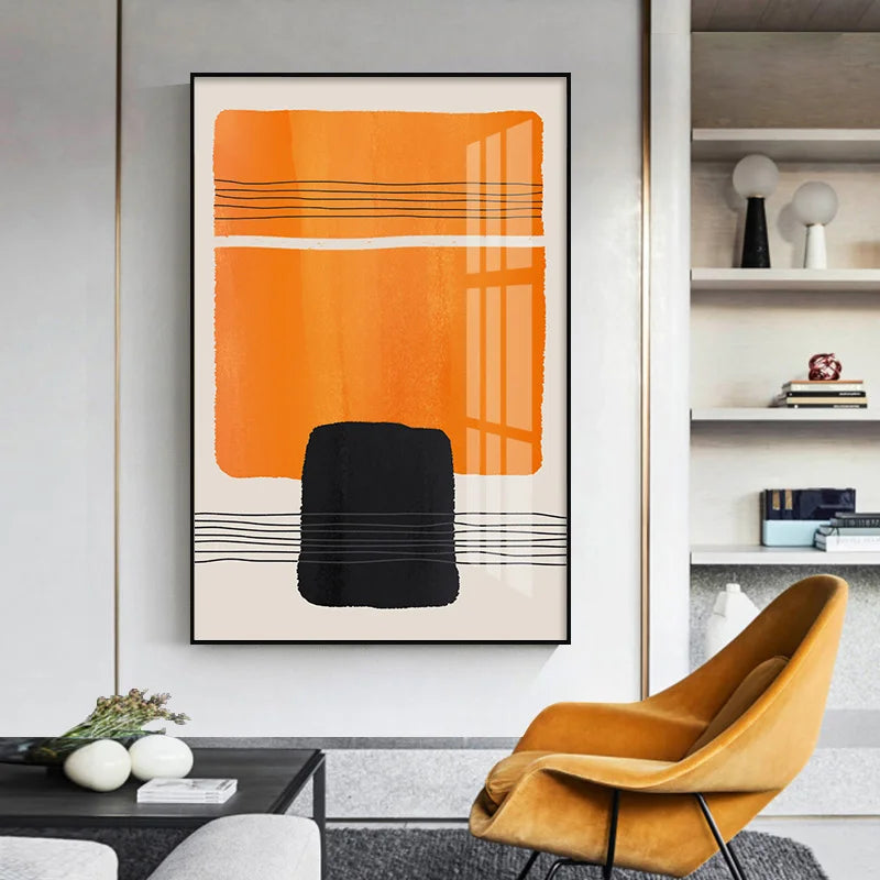 Abstract art piece with orange and black colors in a modern living room setting.