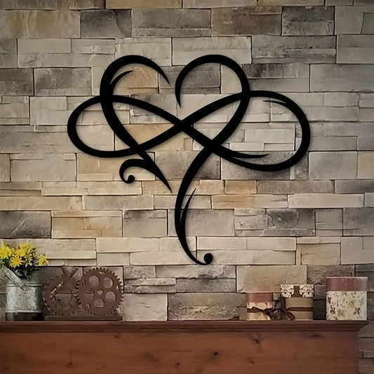 Black infinity symbol on a stone wall with decorative items below
