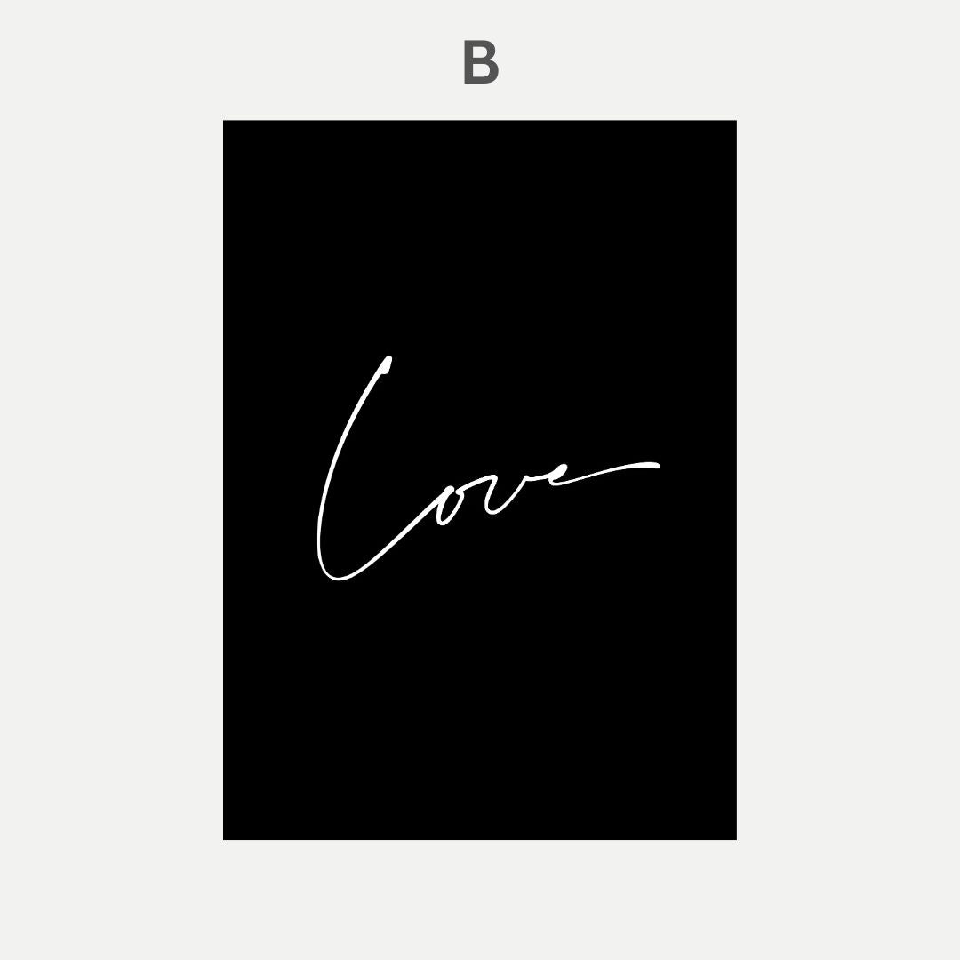 Black poster with the word 'Love' in white cursive text on a light gray background