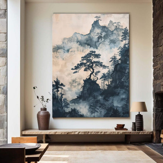 Framed landscape painting of a mountain scene with trees in a modern living room.