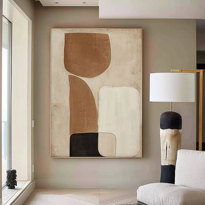 Abstract art piece on a wall in a modern living room