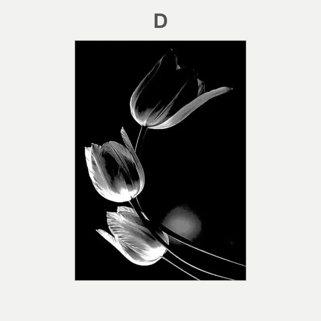 Black and white photo of tulips with a dark border