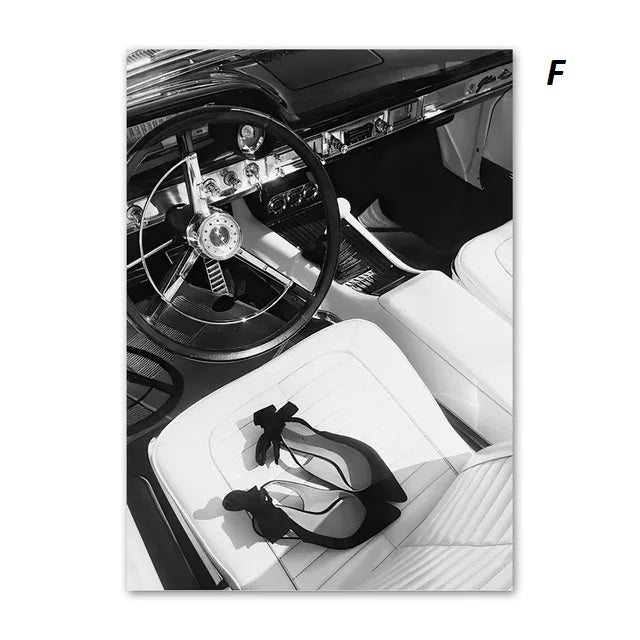 Poster of  Close-up of a car's steering wheel and interior with a pair of black high-heeled shoes on the seat.