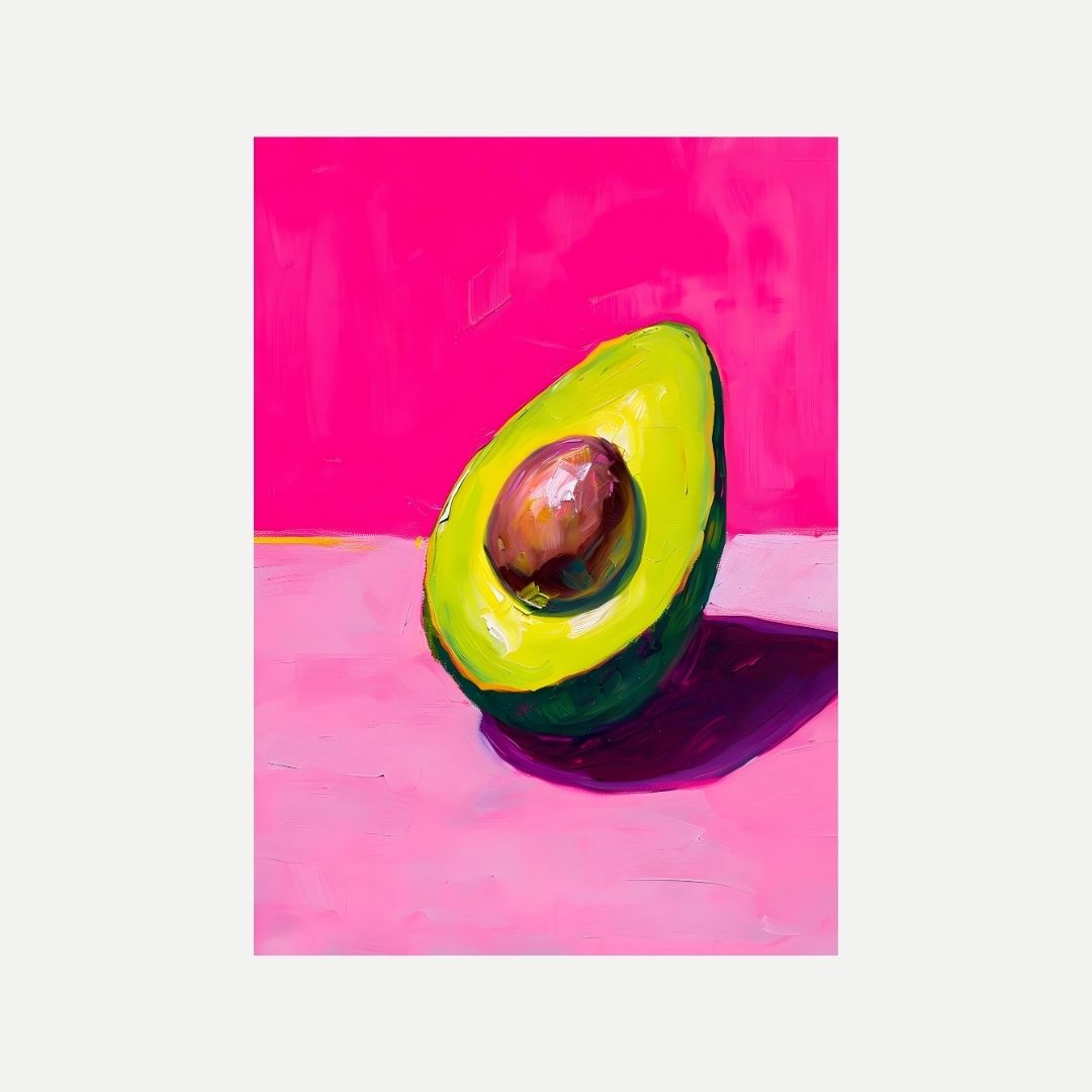 Half-cut avocado on a pink background