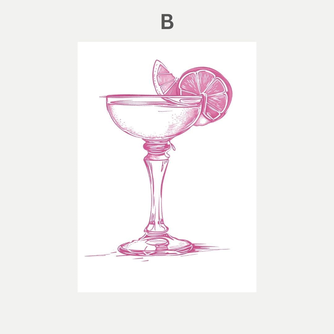 Pink cocktail glass with lemon slices on a white background