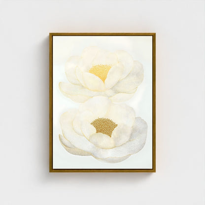 Framed artwork of two white flowers with gold centers on a light gray background
