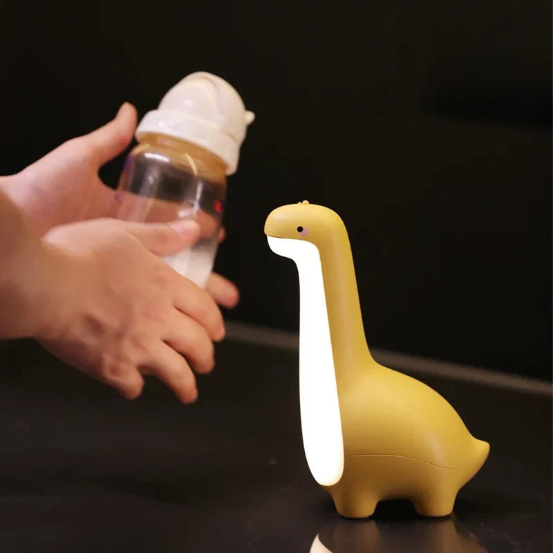 Yellow dinosaur-shaped night light